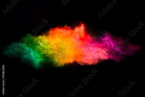 Color Explosion. Dust Particle Isolated on Black Background © Casther