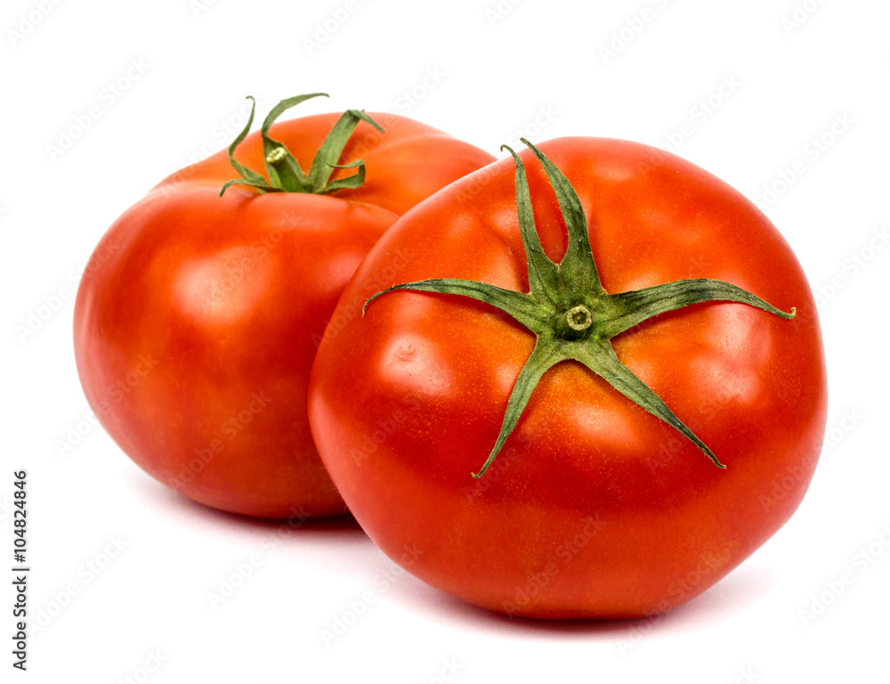 Two tomatoes isolated on a white background. Two tomatoes isolated on a white background.
