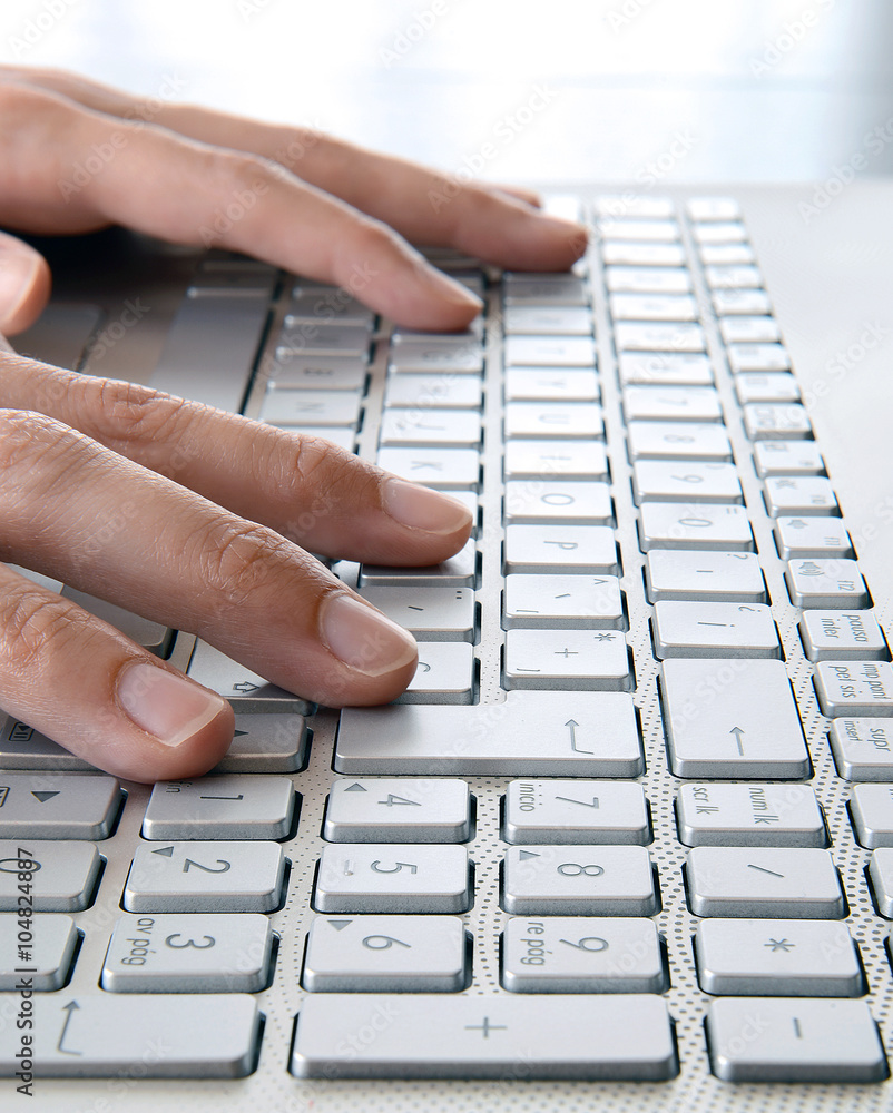 Woman hands typing your computer at work Woman hands typing your computer at work
