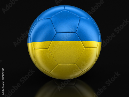 Soccer football with Ukrainian flag. Image with clipping path