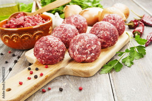 Raw meatballs on the table