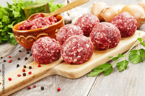 Raw meatballs on the table