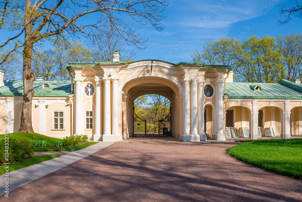 Lomonosov, Leningrad Oblast, Russia - May 10, 2015: Courtyard and arch with gate of Bolshoy (Menshikovskiy) palace. Located in Oranienbaum park on the shore of Gulf of Finland.