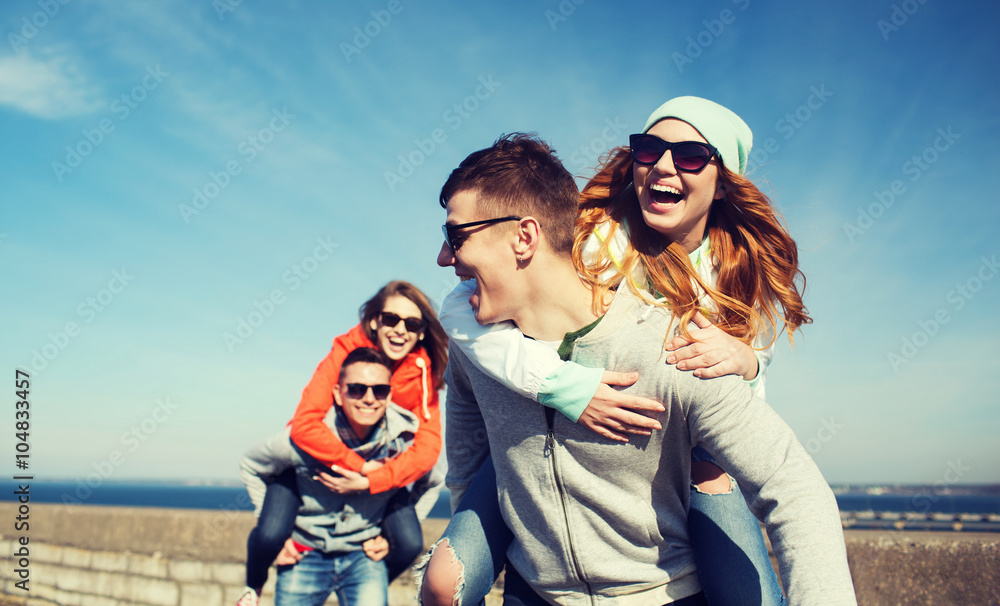 happy teenage friends having fun outdoors happy teenage friends having fun outdoors