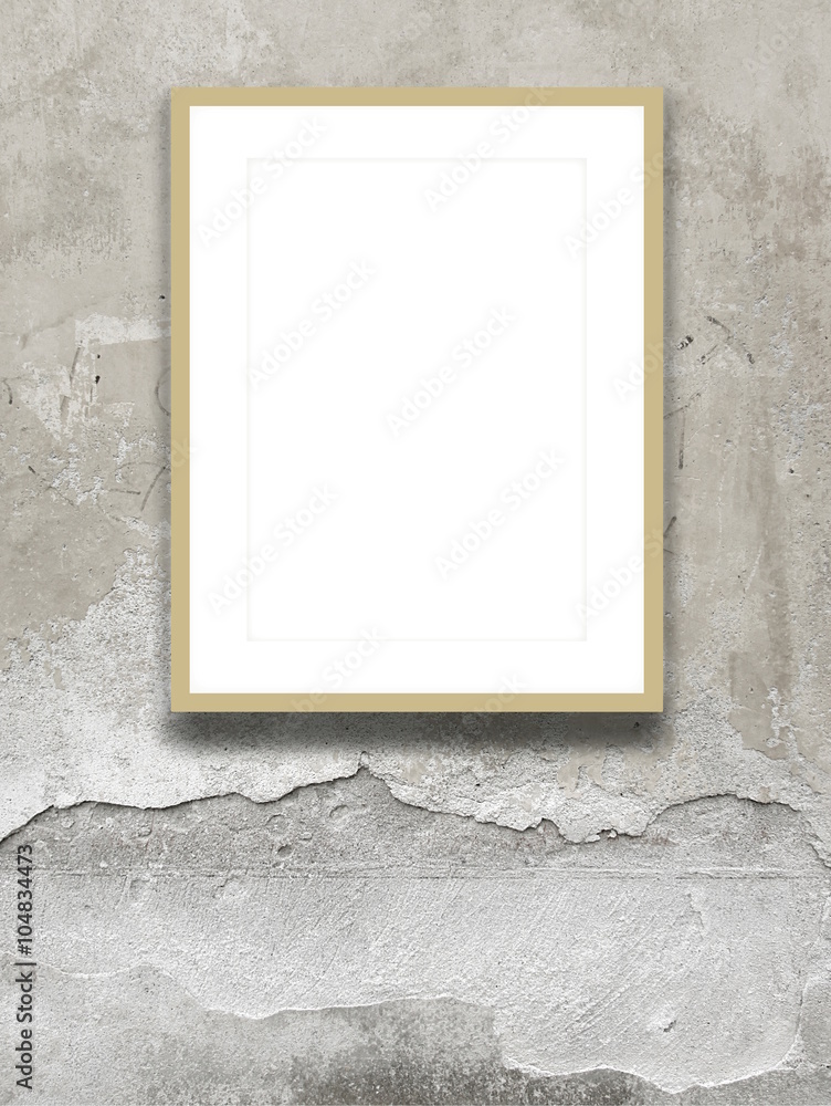 Close-up of one brown picture frame on weathered wall background Close-up of one brown picture frame on weathered wall background