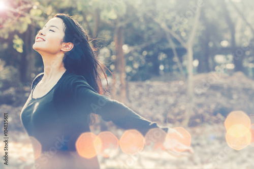 Принти на полотні Happy woman enjoying with nature light. Freedom concept with bea