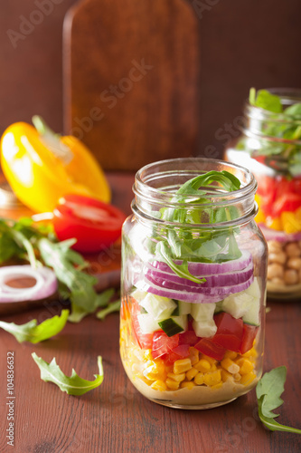 healthy vegetable chickpea salad in mason jar