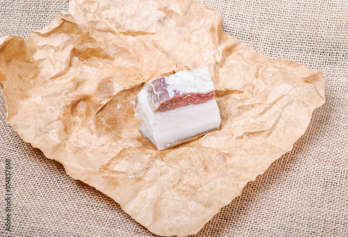 Ukrainian lard on the packaging paper