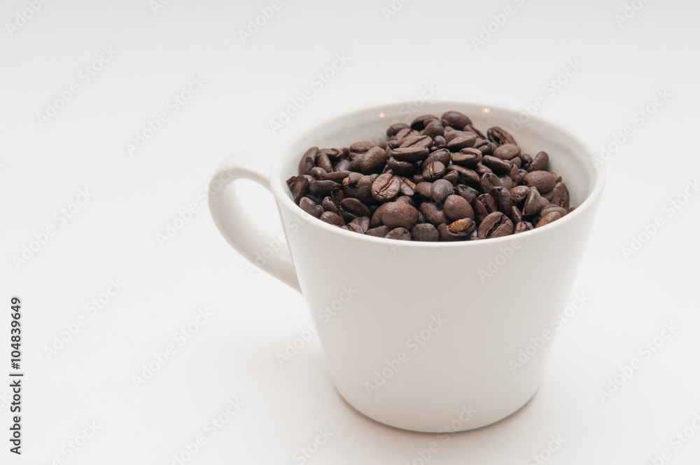 coffee beans in a mug coffee beans in a mug