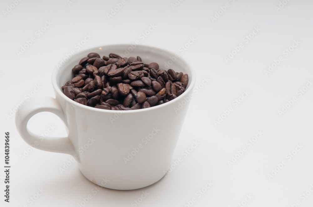 coffee beans in a mug coffee beans in a mug