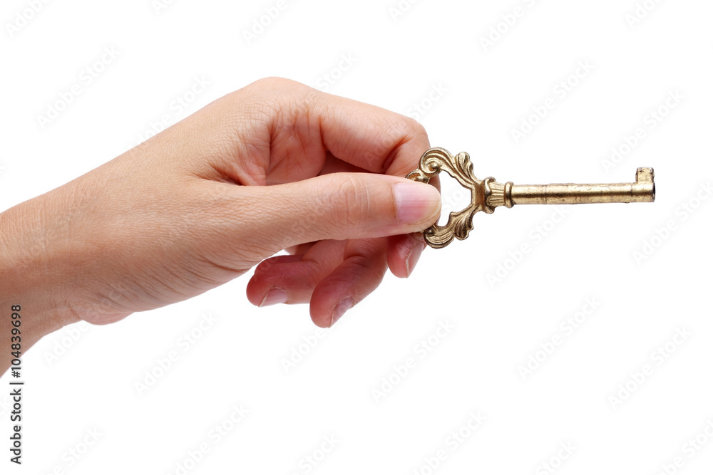 hand holding golden key isolated on white background. hand holding golden key isolated on white background.