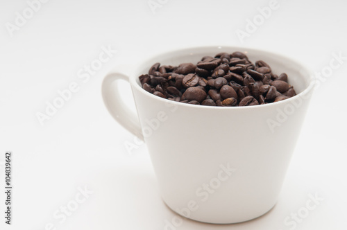 coffee beans in a mug