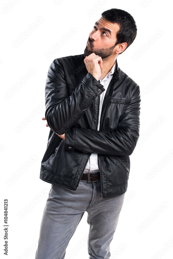Man with leather jacket thinking Man with leather jacket thinking