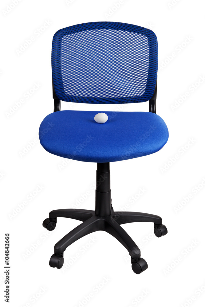 Chicken egg lies on a office chair Chicken egg lies on a office chair