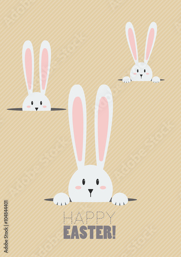 Happy Easter with white rabbits in a hole