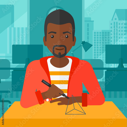 Man using three D pen.