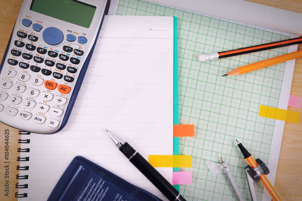 Office table desk with set of Office Stationery or Math Supplies. View from above. Office table desk with set of Office Stationery or Math Supplies. View from above.