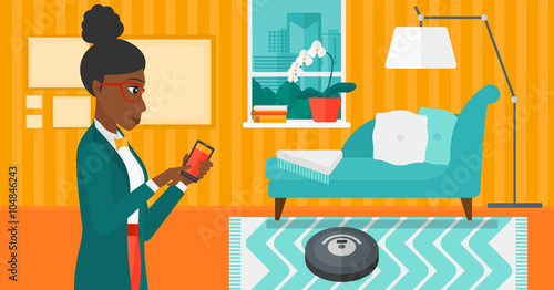 Woman with robot vacuum cleaner.