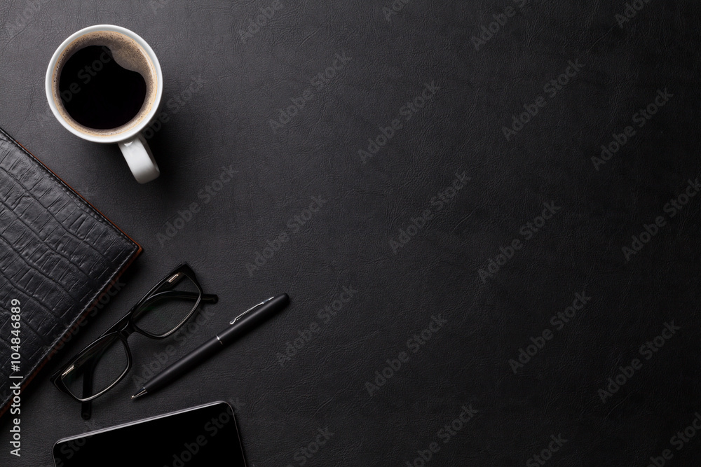 Office leather desk table with coffee and supplies Office leather desk table with coffee and supplies