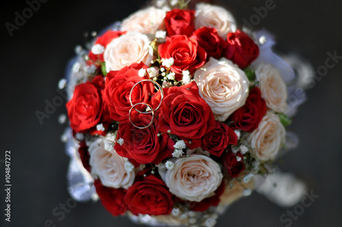 A bouquet of red and white roses