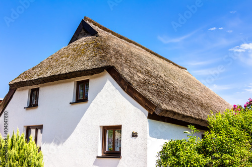 Foto Traditional thatching roof house