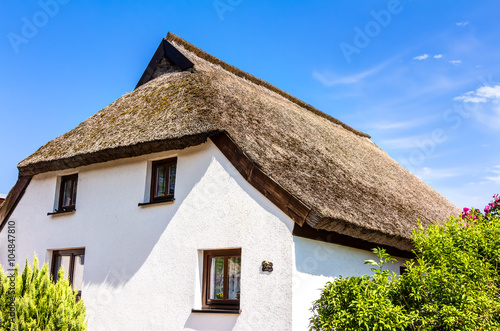 Traditional thatching roof house photo