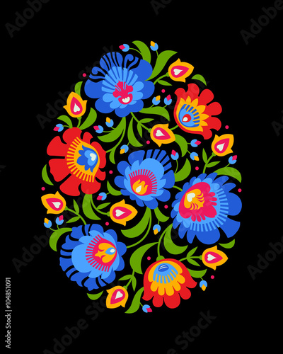 Happy Easter egg made with folk colorful flowers