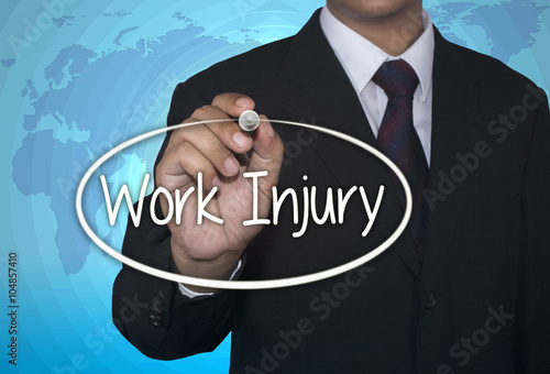 Business concept Hand writing Work Injury on visual screen