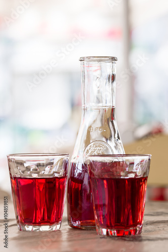The decanter of wine and two glasses. In the tavern in Greece
