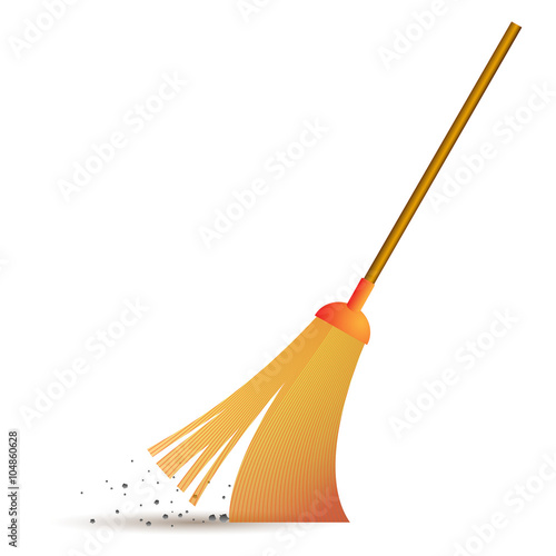 yellow broom sweeps debris on the wooden handle