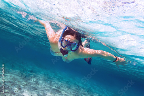 Beautiful women snorkeling in the tropical sea © Patryk Kosmider