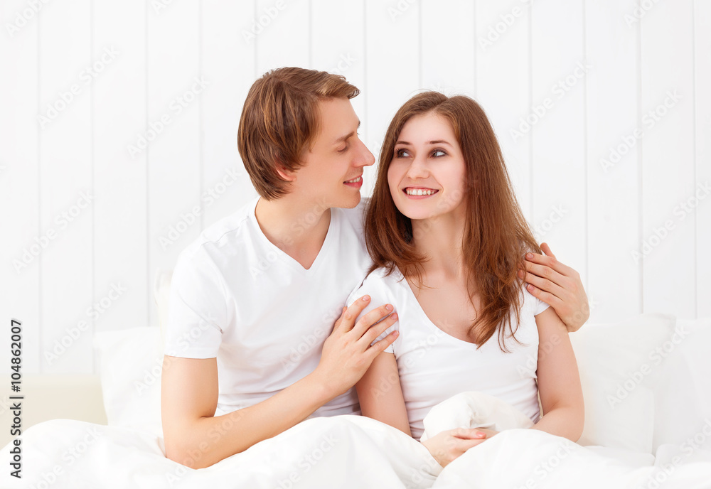 Happy couple in bed Happy couple in bed