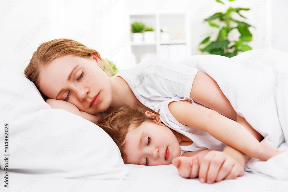 happy family mother and child sleeping in bed happy family mother and child sleeping in bed