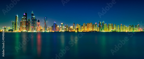 Amazing sunset panorama reflection of Dubai Marina, Dubai, United Arab Emirates