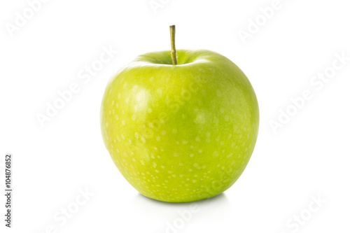 Single fresh green apple isolated on white background.