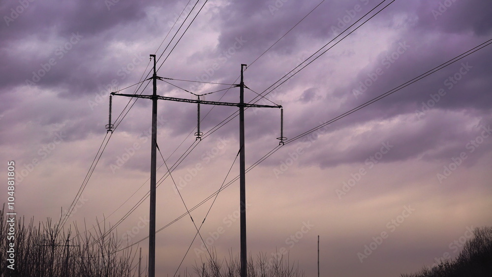 Bearing steel with power cables against the sky. taymlaps Bearing steel with power cables against the sky. taymlaps
