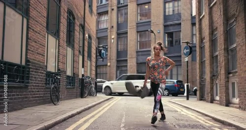 Wallpaper Mural Contemporary funky mixed race woman street dancer dancing freestyle in the city Torontodigital.ca