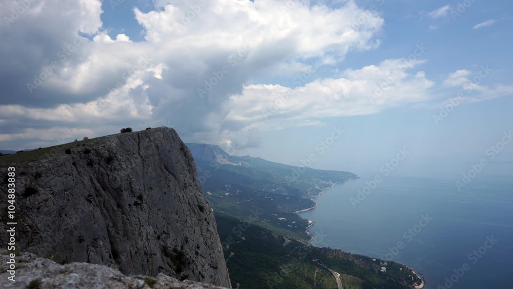 The formation of clouds between the mountains and the sea. Black Sea. Summer.Timelapse The formation of clouds between the mountains and the sea. Black Sea. Summer.Timelapse