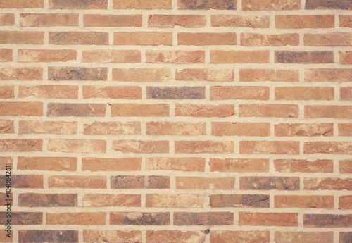 Brown stone brick wall texture and background seamless.
