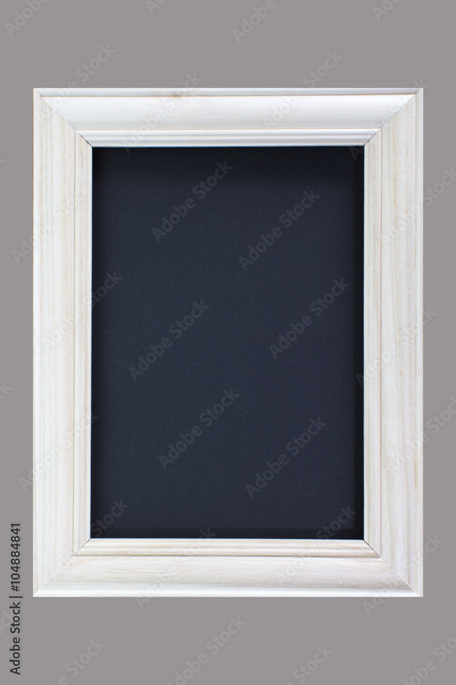 Vintage white wood picture frame on grey blackground