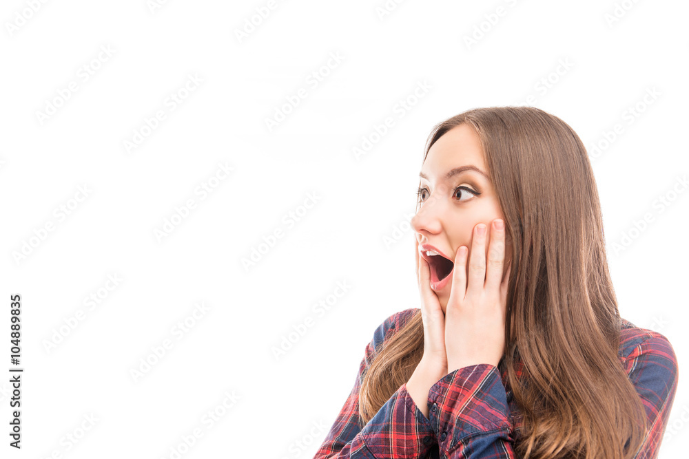 Surprised pretty woman with open mouth touching her face Surprised pretty woman with open mouth touching her face