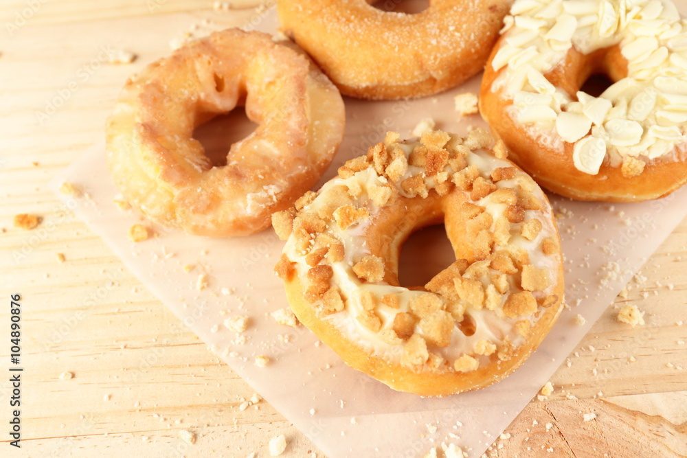 Donuts on wooden background