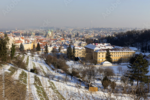 Romantic snowy Prague City in the sunny Day, Czech Republic
