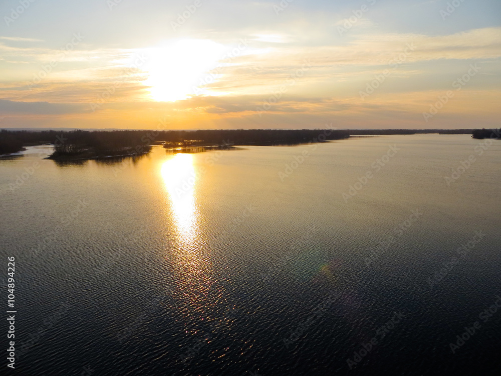 Naklejka premium sunset at the river