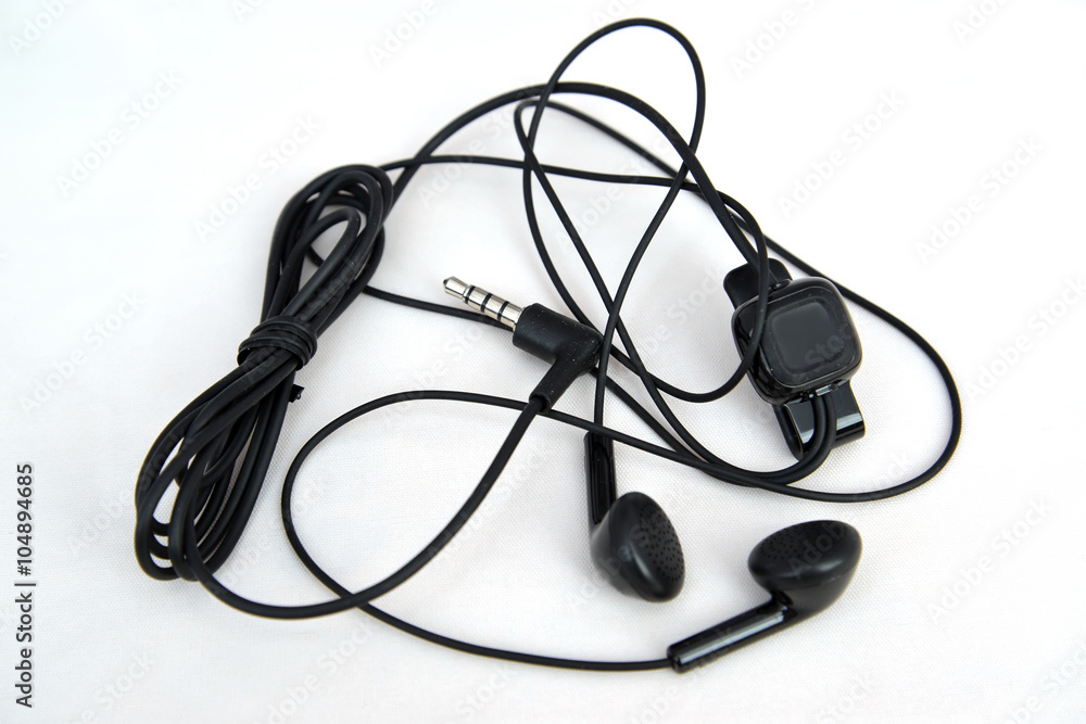 Earphones for the mobile phone on a white background Earphones for the mobile phone on a white background