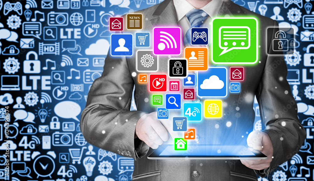 Business man using tablet PC with social media icon set Business man using tablet PC with social media icon set
