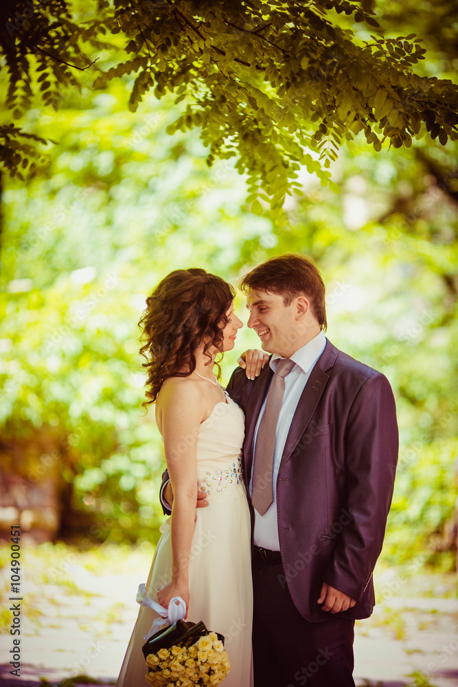 Happy newlywed romantic couple outside