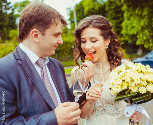 Happy newlywed romantic couple outside