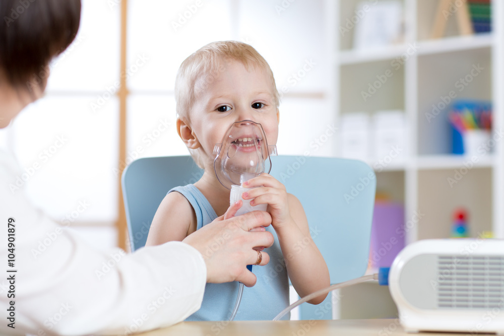 Child with asthma problems making inhalation with mask on her face Child with asthma problems making inhalation with mask on her face