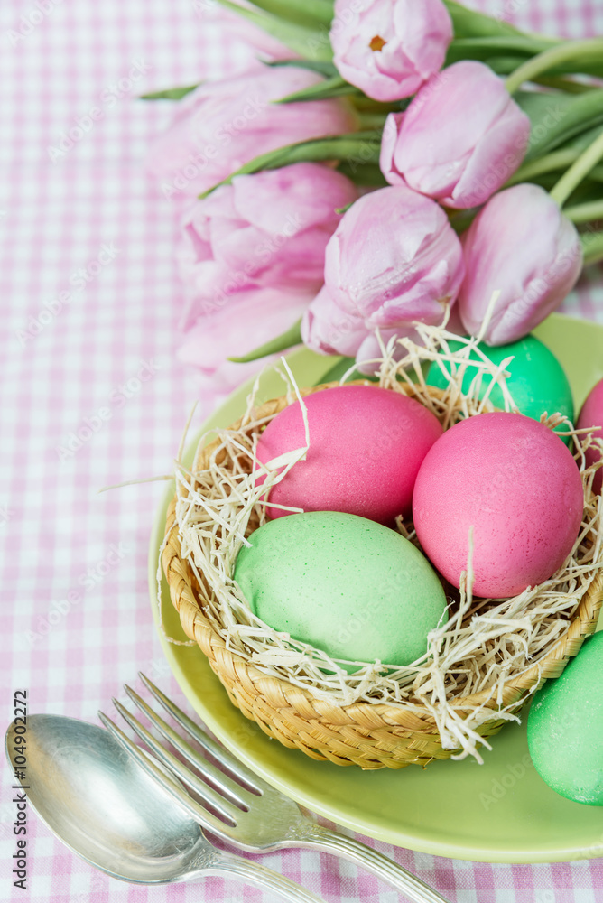 Basket with flowers and Easter eggs Basket with flowers and Easter eggs